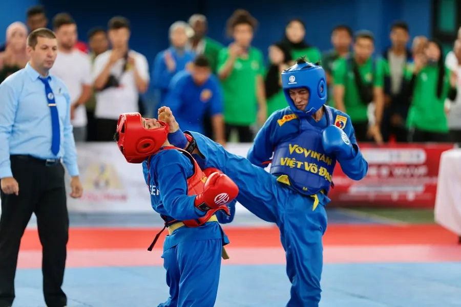 Combat pied-poing en compétition de Vovinam